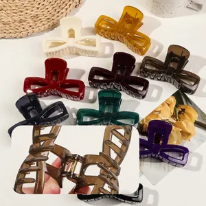 Elegant bow hair claws in various colors with a strong grip for back head hairstyles
