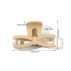 Large beige bow hair claw clip with size measurements 9.5cm long for thick hair styling