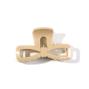 Large cream bow hair claw clip made of durable soft resin for thick hair styling