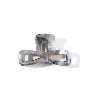 Minimalist marble pattern bowtie hair claw clip in grey acetate for elegant updo hairstyles