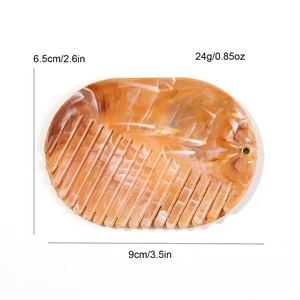 Peigne ovale en ambre écaille de tortue avec trou de suspension et dimensions
