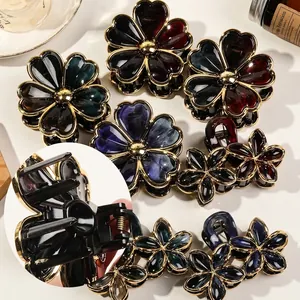 Elegant flower hair claw clips with gold trim and marble resin texture set