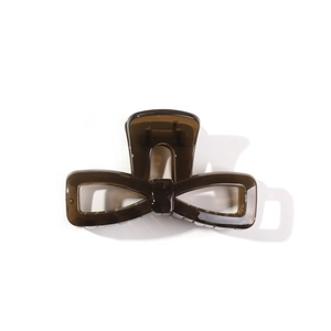 Elegant dark brown bow hair claw clip made of polished UV-painted translucent resin
