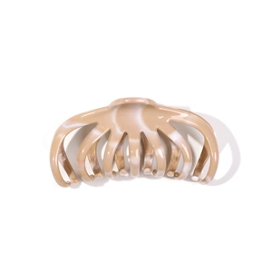 Large soft silicone hair claw clip with beige marble pattern for thick hair bun