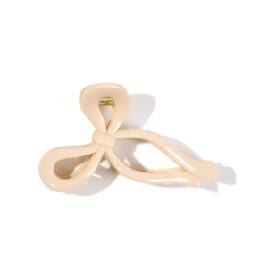 Elegant beige bow-shaped hair claw clip with glossy UV finish for stylish women