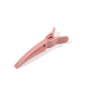 Pink matte hair root volumizing clip for high cranial top hair styling and fixing