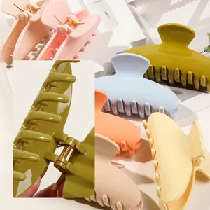 Glossy semi-circle hair claws for women in multiple colors with strong metal springs
