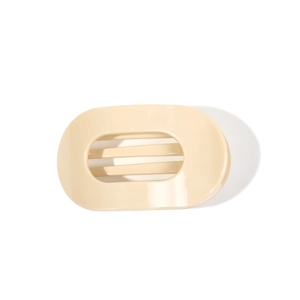 Minimalist cream oval hollow hair claw clip with glossy finish for elegant hairstyling