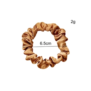 Elegant champagne satin silk scrunchie with 6.5cm diameter and stylish pleated design