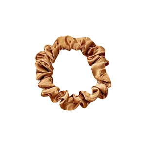 Elegant champagne satin scrunchie with pleated texture and glossy silk finish for ponytails