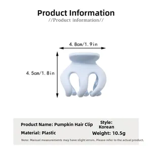 Détails et dimensions de la pince à cheveux citrouille bleu clair en plastique