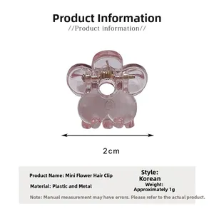 Vue détaillée d'une mini pince à cheveux fleur rose de 2cm avec dimensions et détails
