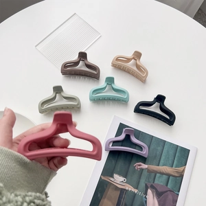 Detailed view of matte hollow mermaid tail hair claws in seven assorted aesthetic colors