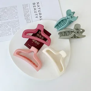 Five-piece set of matte cream shark hair clips in assorted pastel colors for women