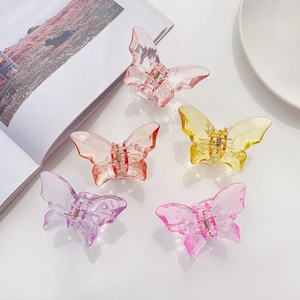 Set of five colorful translucent butterfly hair clips with sleek metallic spring mechanism
