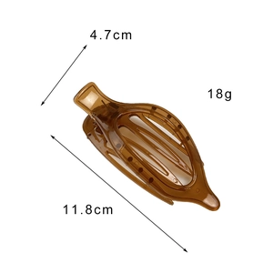 Pince à cheveux ambre marron avec dimensions 11,8cm de long et poids de 18g