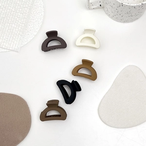 Set of 5 matte butterfly claw clips in coffee, cream, brown, black and amber tones