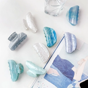 Elegant set of 8 acetate marble hair claws in various gradient colors for women