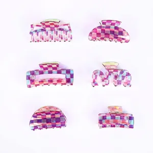 Holographic checkered acetate hair claws in various geometric sizes for versatile styling
