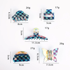Detailed views of checkered acetate hair claws with precise dimensions and weights