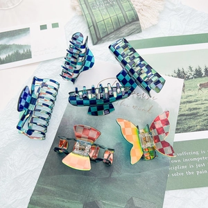 Checkerboard pattern hair claw clips set in various shapes with colorful resin finish
