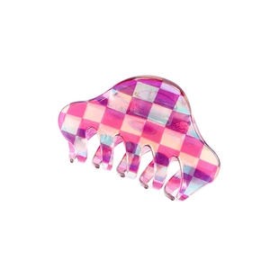 Pink and white checkered resin hair claw clip with holographic finish on white background