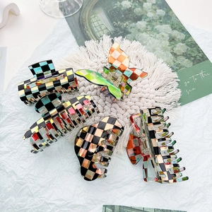 Set of five colorful checkerboard acetate hair claws with iridescent seashell finish