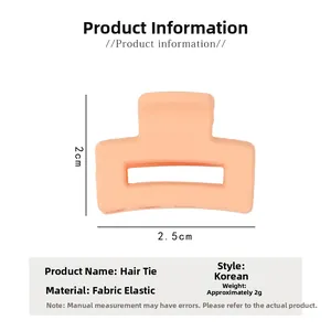 Vue détaillée d'une mini pince à cheveux orange-rose avec dimensions 2,5 cm x 2 cm