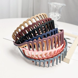 Detail of matte colorful non-slip headbands with teeth for styling hair and bangs