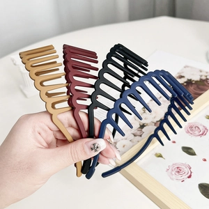 Matte wavy teeth headbands in brown, red, black, and blue colors for non-slip styling
