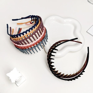 Detail view of colorful non-slip matte hairbands with inner teeth for secure hair styling