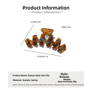 Detailed dimensions of the acetate hair claw clip showing length of 10.5cm and height of 4.5cm