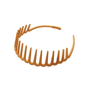 Matte mustard yellow toothed headband for women with non-slip plastic grip design