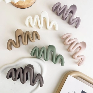 Set of six large matte wavy hair claws in various elegant Morandi colors for women