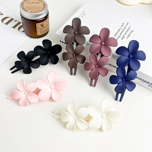Matte flower hair clips set in six colors including black, pink, and cream for women