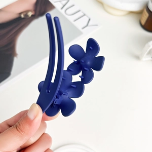 Matte dark blue double flower hair claw clip for elegant women styling and hair accessories