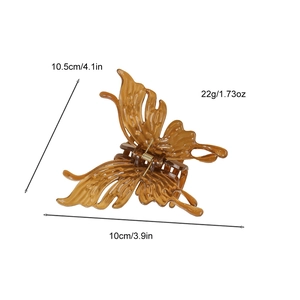 Pince à cheveux papillon ambre 10,5cm avec design en résine creuse pour femmes