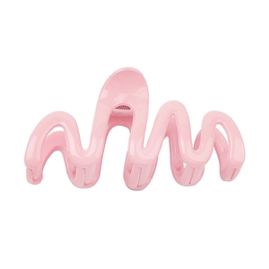 Creamy light pink wavy hair claw clip with a unique irregular curved design for women