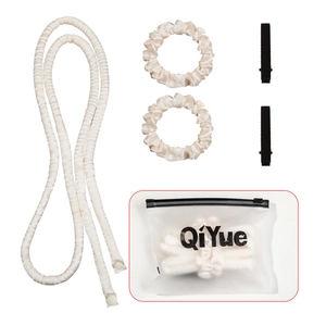Creamy white heatless hair curler set with two scrunchies, clips and a storage pouch