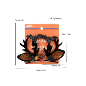 Detailed Halloween hair clip set featuring black plush horns and glitter bat wings on card
