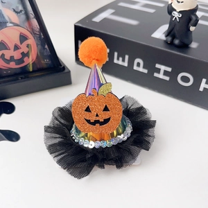 Detailed view of Halloween mini party hat with glitter pumpkin, sequins, and black mesh veil