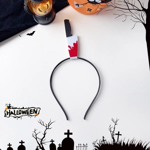 Detail of Halloween headband with bloody knife design for spooky party costume props