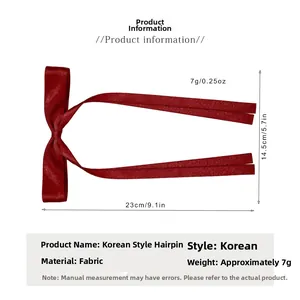 Burgundy bow hair clip size chart showing 23cm length and 7g weight measurements