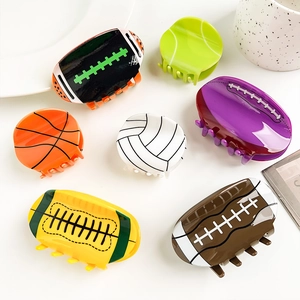 Set de 7 pinzas para el cabello de acrílico con diseños de pelotas de rugby y baloncesto