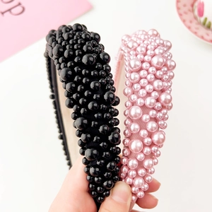 Elegant wide sponge headband with faux pearls in black and pink for high skull top look