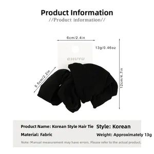 Detail shot of wide black elastic hair scrunchie with 5.5cm width and 12cm length