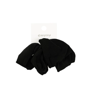Set of 4 soft wide black cotton hair ties displayed on a white hanging card