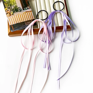 Élastiques à cheveux avec longs rubans rose et lavande pour des queues de cheval élégantes
