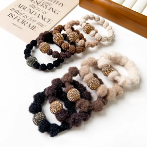 Plush Maillard style hair scrunchies with rhinestone ball charms for women in assorted colors