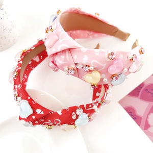 Serre-têtes noués roses et rouges avec motifs cœurs, perles et strass scintillants